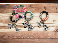 Cow print wristlets